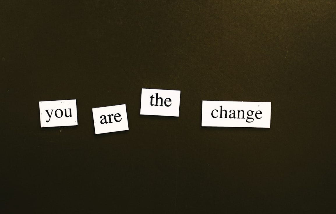 a refrigerator door with magnets that say you are the change