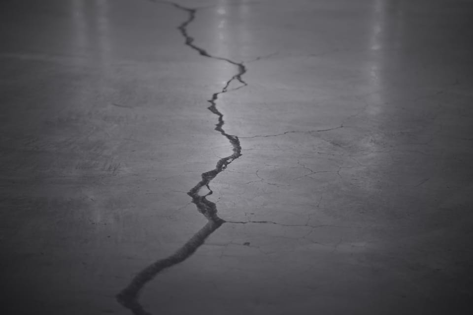 A crack running through concrete